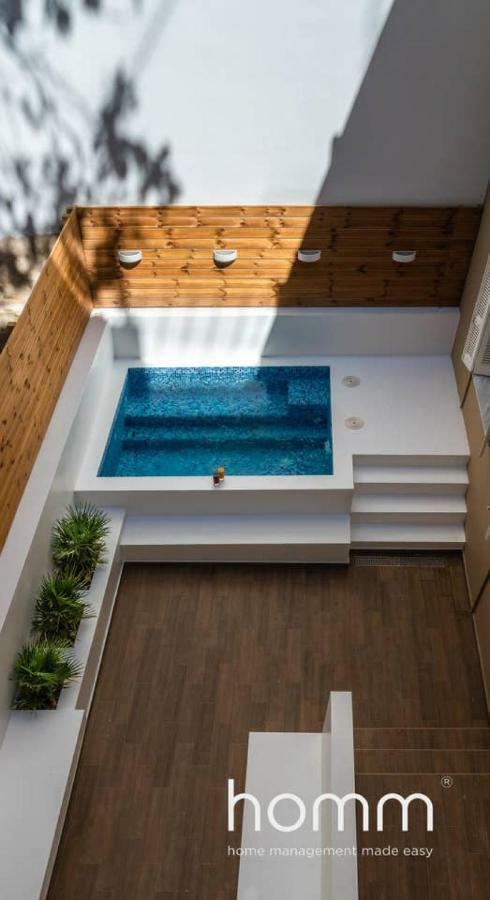 Nemeseos Ground Floor Homm Apartment With Roof Garden And Wading Pool Athena Bagian luar foto